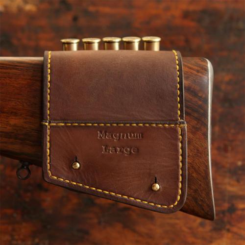 The Kimberley Rifle Stock Cartridge Pouch, leather product, brass studs, yellow stitching, handcrafted