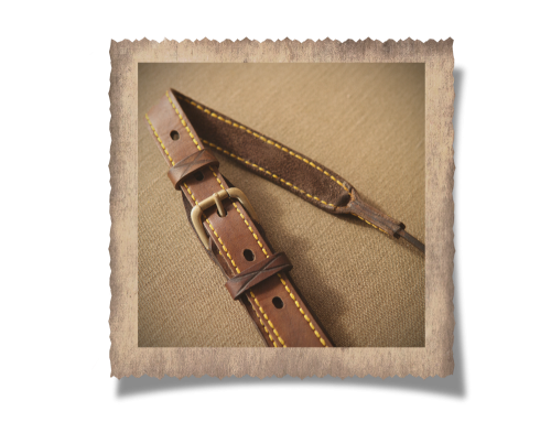 The Wilderness Leather Rifle Sling, leather sling, yellow stitching, brass buckle