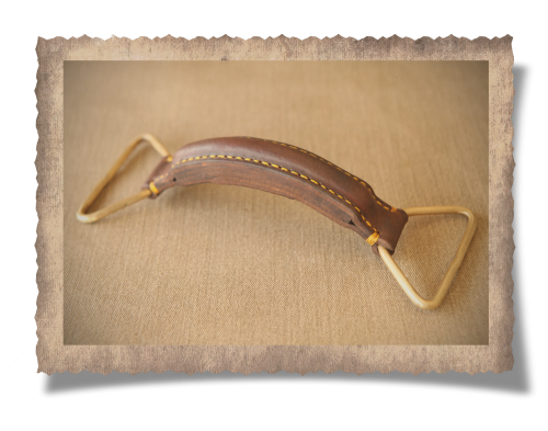 The Barberton Pigeon Carrier Handle, brass, leather product, handcrafted, yellow stitching, handcrafted
