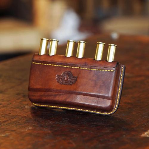 The Somerset Double Rifle Cartridge Pouch, cartridges, bullets, leather product, yellow stitching, logo