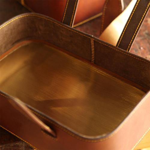brass lining, leather product, lid, straps
