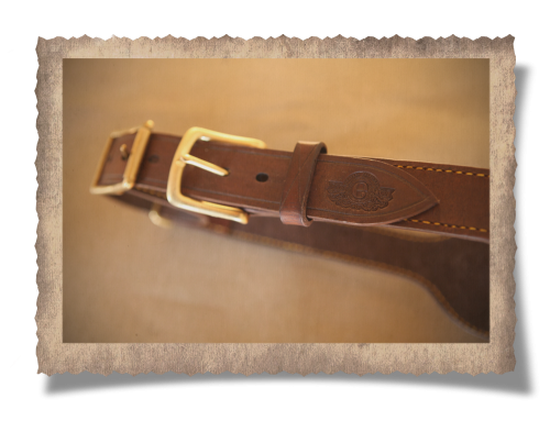 The Cradock Culling Belt, brass buckle, leather product, logo, holes, yellow stitching, handcrafted